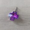 DIJE DE ACERO CRUZ DEL EQUILIBRIO 18 MM DE ACRÍLICO VIOLETA. 18 MM