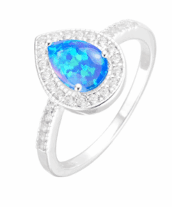 ANILLO PLATA  C/ZIRCONES Y LAGRIMA RESINADA. PESO APROX. 1.89 GRS.