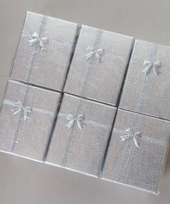 ESTUCHE PARA CONJUNTOS X 12 UNIDADES COLOR PLATEADO. MEDIDAS 7 X 9 CM