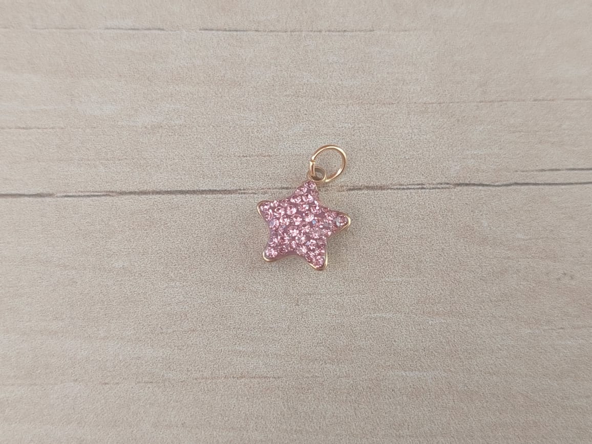 DIJE DE ACERO DORADO ESTRELLA CON STRASS ROSA. 12 MM