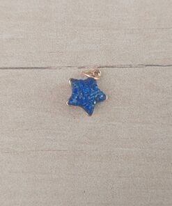 DIJE DE ACERO DORADO ESTRELLA CON STRASS AZUL. 12 MM
