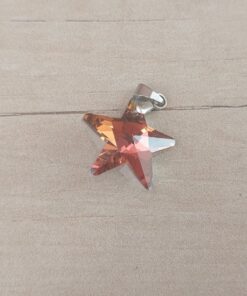 DIJE DE ACERO ESTRELLA 20 MM DE ACRÍLICO COLOR TORNASOL MORADO. 20 MM
