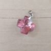 DIJE DE ACERO CRUZ DEL EQUILIBRIO 18 MM DE ACRÍLICO ROSA. 18 MM