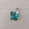 DIJE DE ACERO MARIPOSA DE ACRÍLICO VERDE. 18 X 15 MM