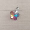 DIJE DE ACERO MARIPOSA DE ACRÍLICO TORNASOL MORADO. 18 X 15 MM
