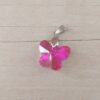 DIJE DE ACERO MARIPOSA DE ACRÍLICO FUCSIA. 18 X 15 MM