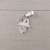 DIJE DE ACERO MANO DE FATIMA CON OJITO CALADO 12 X 15 MM