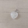 DIJE DE ACERO PIEDRA SIMIL CUARZO BLANCO EN FORMA DE CORAZÓN. 15 MM