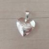 DIJE DE ACERO BLANCO RELICARIO CORAZÓN CON LEYENDA "I LOVE YOU". TAMAÑO 23 MM