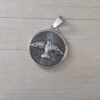 DIJE DE ACERO MEDALLA 25 MM ESPÍRITU SANTO.