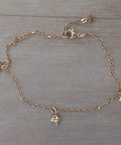 TOBILLERA DE ACERO DORADO ESPEJITO CON DIJES CORAZON. LARGO 21 + 3,5 CM EXT.