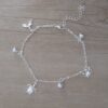 PULSERA DE ACERO BLANCO ESPEJITO CON DIJE BALLENA, TORTUGA, CANGREJO Y BOLITAS INTGERCALADAS. LARGO 19 CM + EXT. 4,5 CM