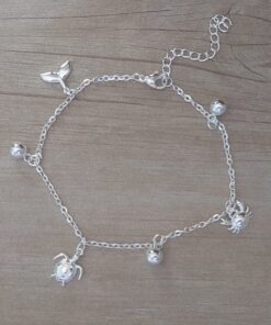 PULSERA DE ACERO BLANCO ESPEJITO CON DIJE BALLENA, TORTUGA, CANGREJO Y BOLITAS INTGERCALADAS. LARGO 19 CM + EXT. 4,5 CM