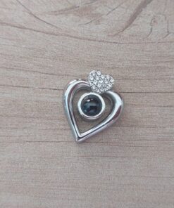 DIJE DE ACERO CORAZÓN CON "TE AMO" EN 100 IDIOMAS DIFERENTES. MEDIDAS 15 X 18 MM