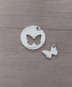 DIJE DE ACERO MEDALLA CON MARIPOSA CALADA PARA PARTIR Y GRABAR. PULIDA DE UN SOLO LADO. 20 MM. ESPESOR 1 MM