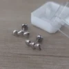 Aro de acero pasante con tres corazones