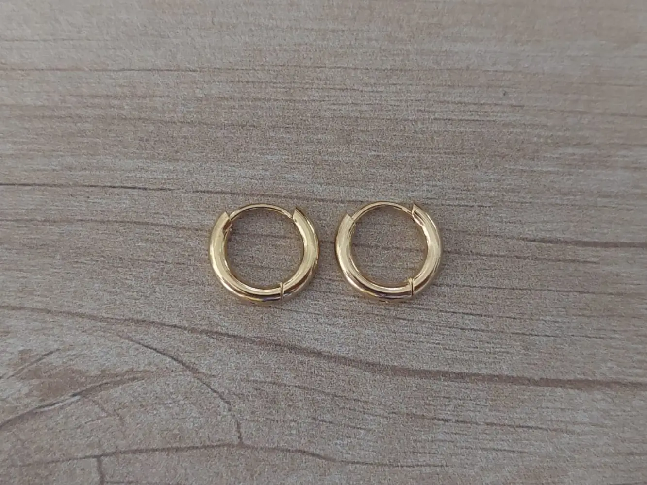 Aro de acero dorado bisagra
