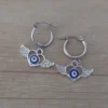 Aro argolla de acero con corazón con strass en sus alas y ojo turco central