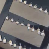 Blister de 36 aros bisagra de acero combinado con dorado