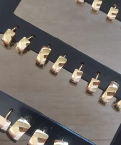 Blister de aros de acero dorado bisagra