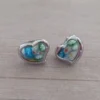Aro de acero pasante en forma de corazón con cristal de murano central