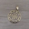 dije de acero dorado nudo de bruja