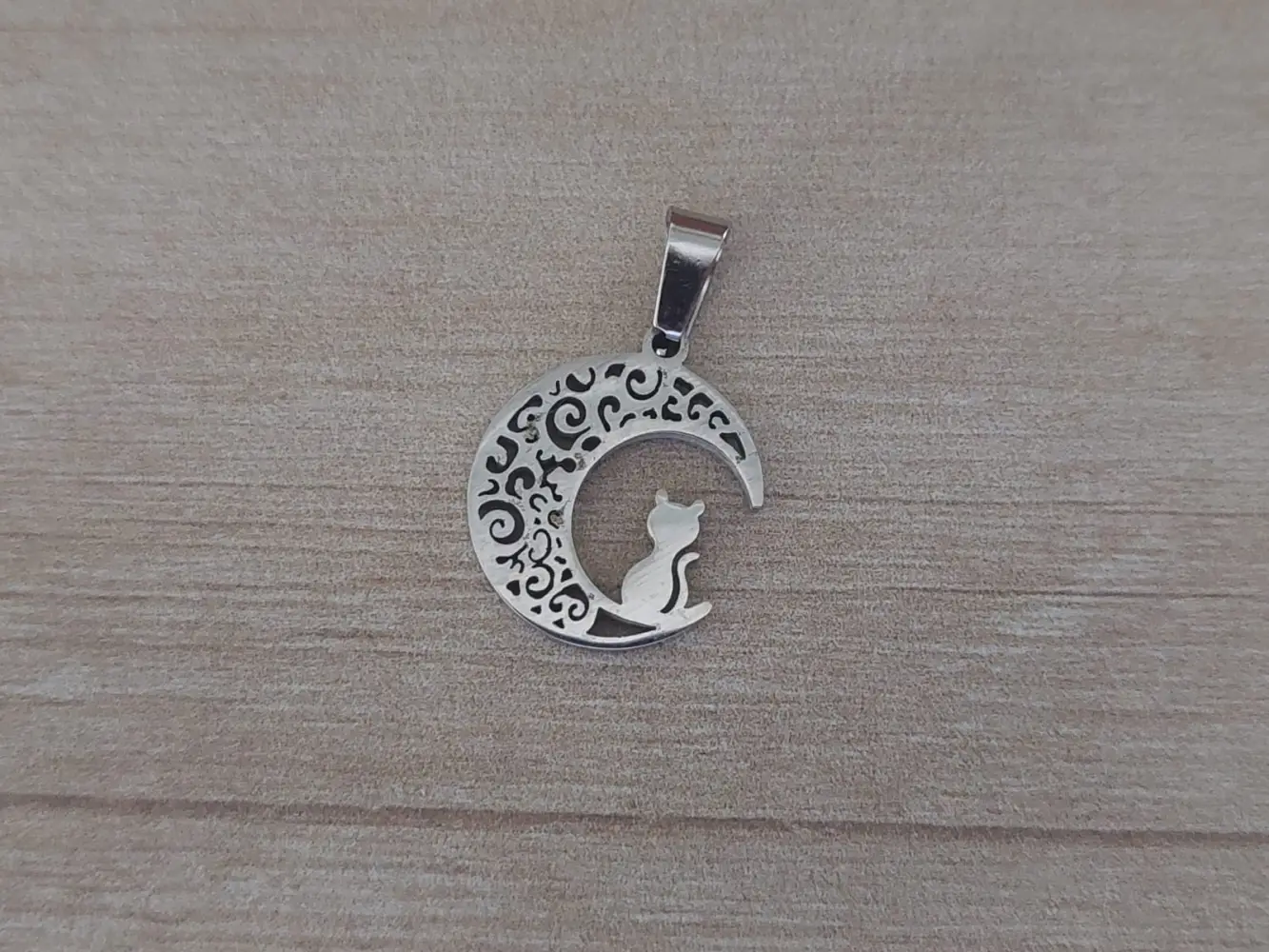 dije de acero luna con gato