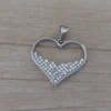 dije de acero corazon con strass