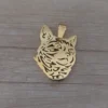 dije de acero dorado gato calado