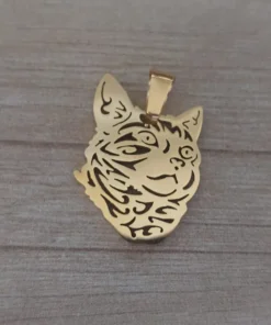 dije de acero dorado gato calado