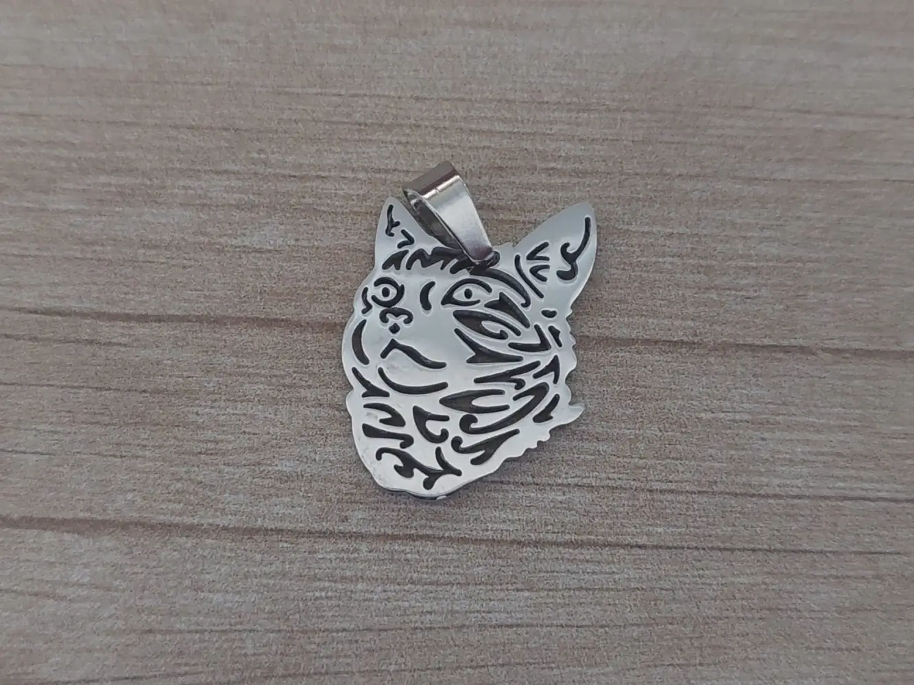 dije de acero gato calado
