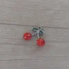 dije de acero guinda o cereza