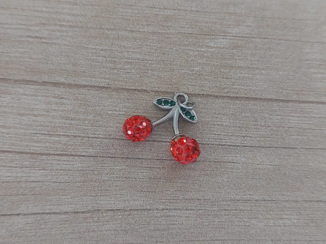dije de acero guinda o cereza