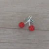 dije de acero blanco guinda o cereza