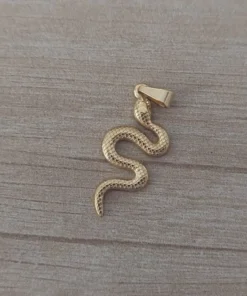 dije de acero dorado vibora