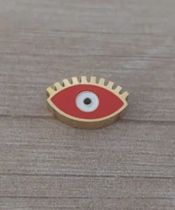 dije de acero dorado ojo