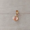 dije de acero dorado pastilla