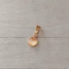 dije de acero dorado pastilla