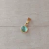dije de acero dorado pastilla