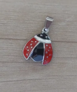 dije de acero vaquita san antonio