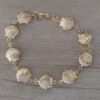 pulseras de acero dorada con ostras