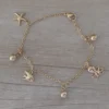pulseras de acero dorado dijes marinos