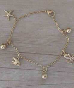 pulseras de acero dorado dijes marinos