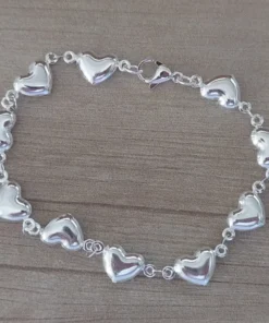 pulsera de acero blanco corazones