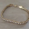 pulsera acero dorado tejida con strass