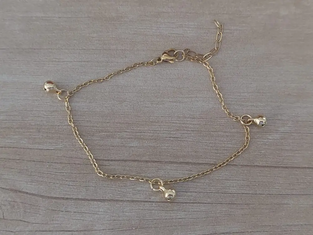 tobillera acero dorado con bolitas