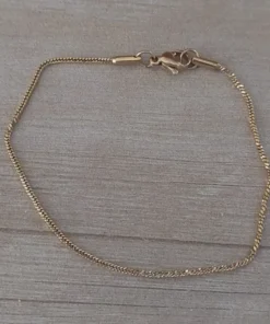 pulsera de acero dorado