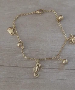 pulsera de acero dorado dijes marinos