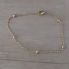 pulsera de acero dorado bolitas combinadas