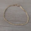 pulsera de acero dorado